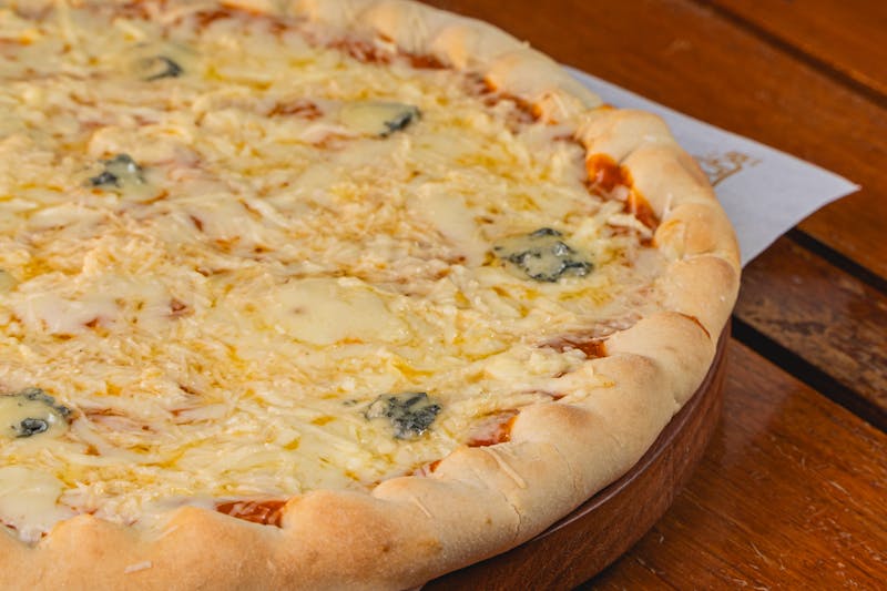 Five cheese pizza with golden bubbling cheese